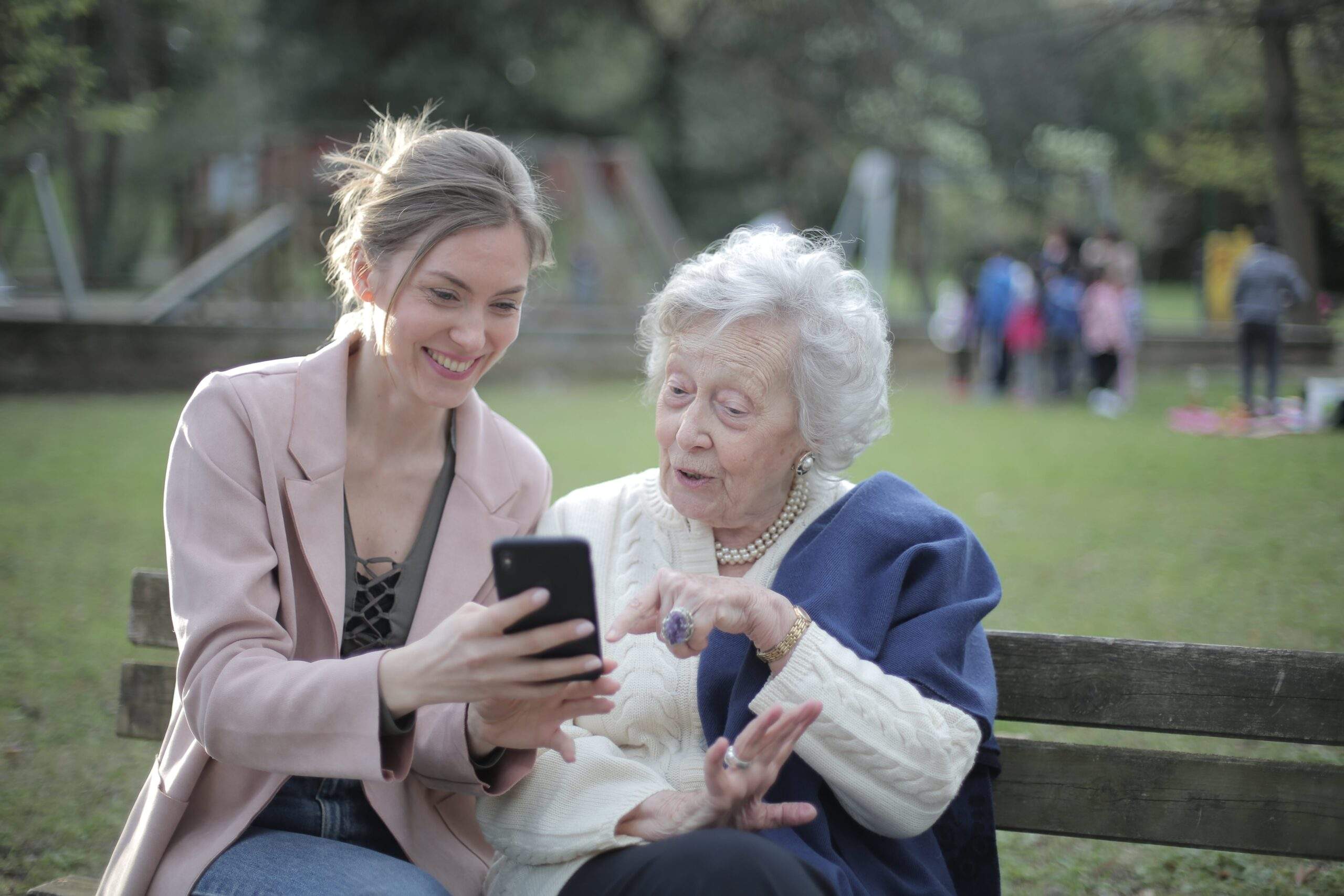 Caregiver holding senior hand